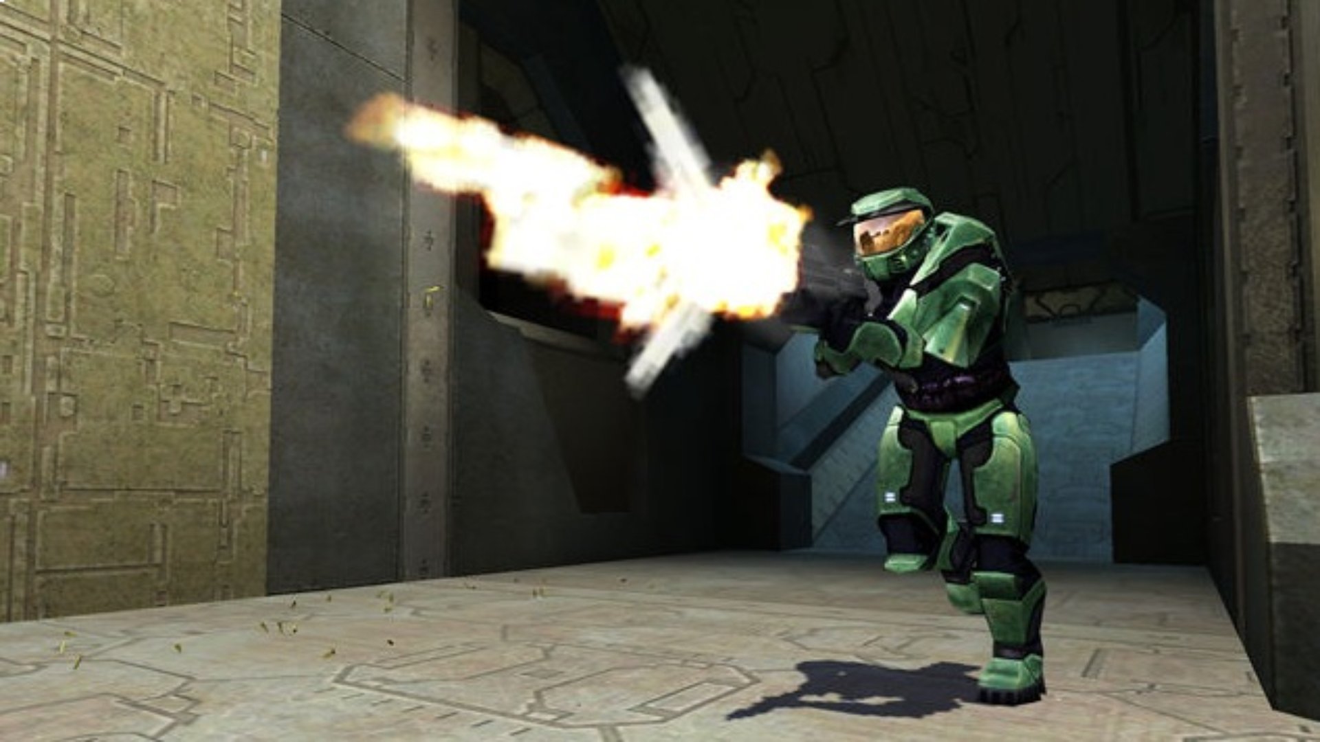 Halo: Combat Evolved screenshot showing Master Chief charging forward while firing a gun