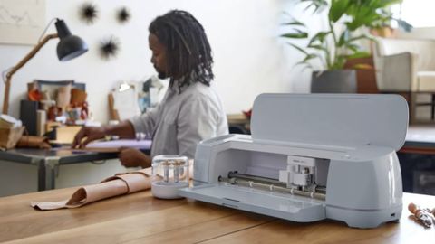 A photo of the Cricut Maker 3 on a kitchen table