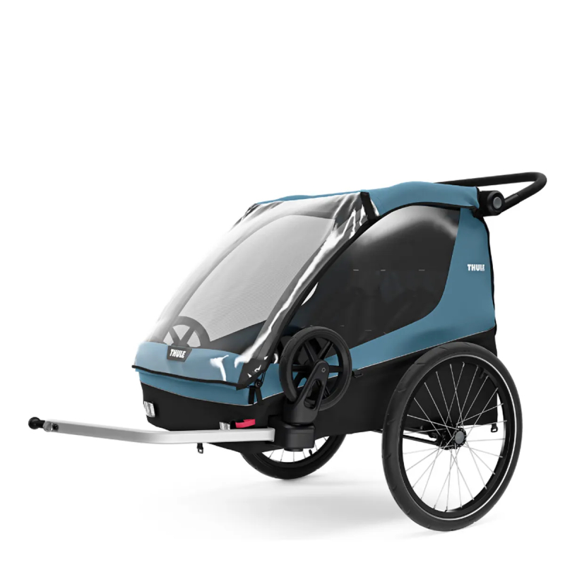 Side angle of the Thule Courier Kid's Bike Trailer on a white background