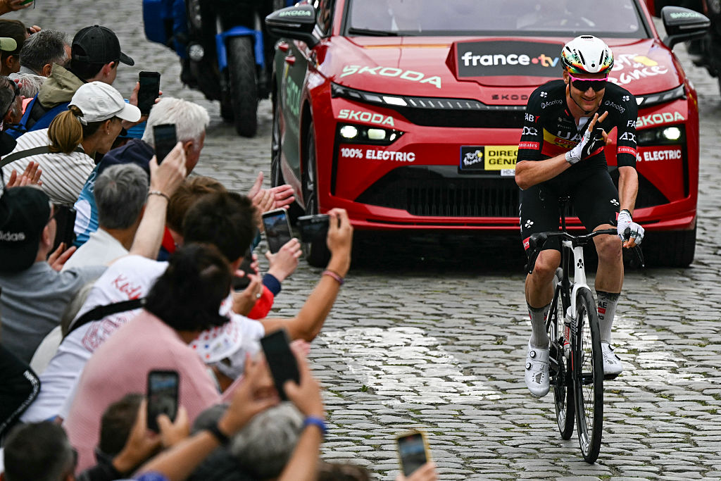 UAE Team Emirate - XRG team's Belgian rider Tim Wellens reacts after securing the King of the Mountain points at the summit of Cote de Cassel during the 3rd stage of the 112th edition of the Tour de France cycling race, 178.3 km between Valenciennes and Dunkerque (Dunkirk), Northern France, on July 7, 2025. (Photo by Loic VENANCE / AFP) (Photo by LOIC VENANCE/AFP via Getty Images)