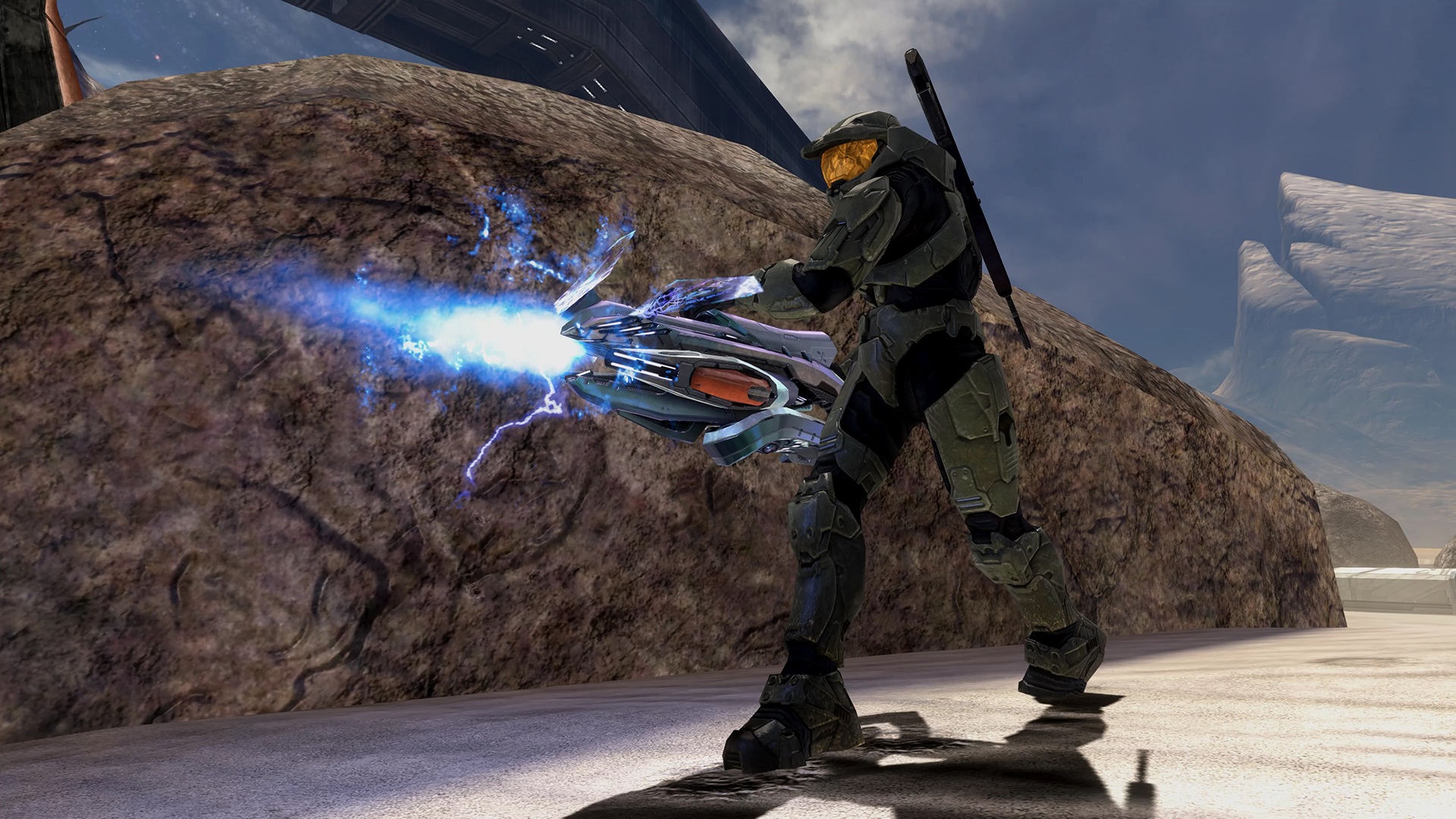 Halo 3 screenshot showing Master Chief firing out a laser-like shot from a big weapon