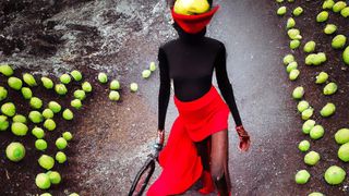 The weirdest AI art: an image of a model playing tennis with a tennis ball as a head