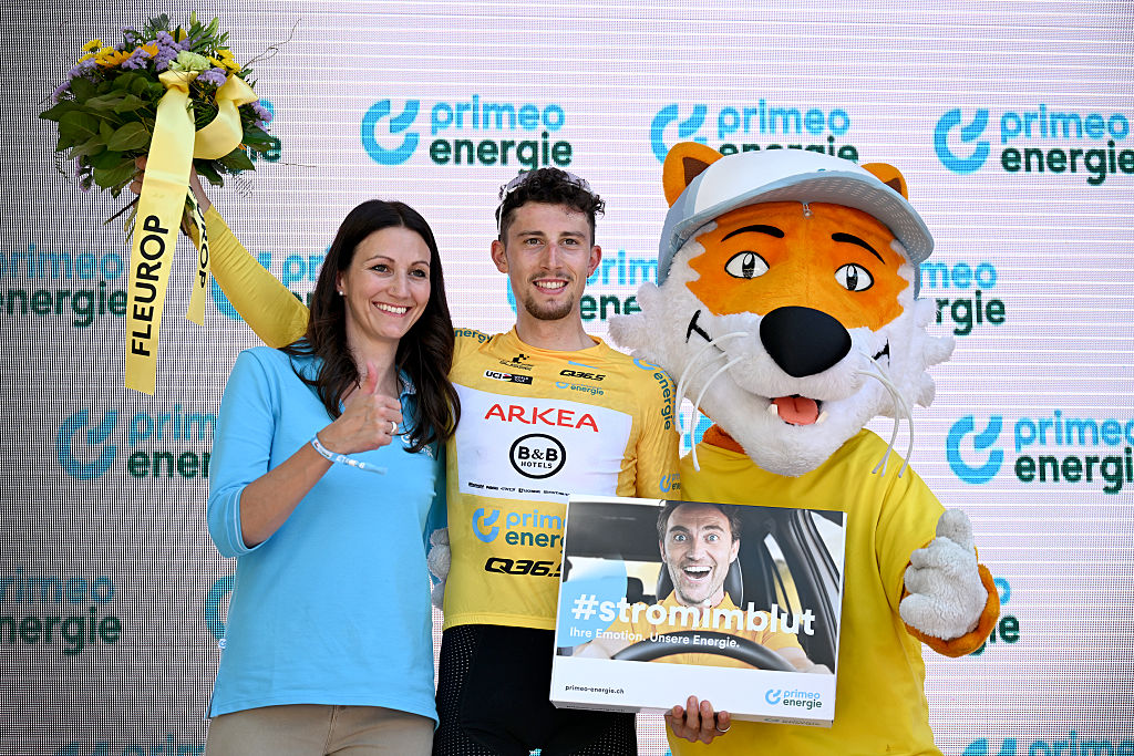 NEUHAUSEN AM RHEINFALL, SWITZERLAND - JUNE 20: Kevin Vauquelin of France and Team Arkea - B&B Hotels - Yellow Leader Jersey celebrates at podium during the 88th Tour de Suisse 2025, Stage 6 a 186.7km stage from Chur to Neuhausen am Rheinfall / #UCIWT / on June 20, 2025 in Neuhausen am Rheinfall, Switzerland. (Photo by Tim de Waele/Getty Images)