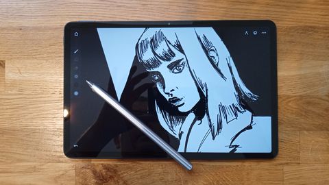 Huawei Matepad 11 review, a photo of a drawing tablet on a wooden table