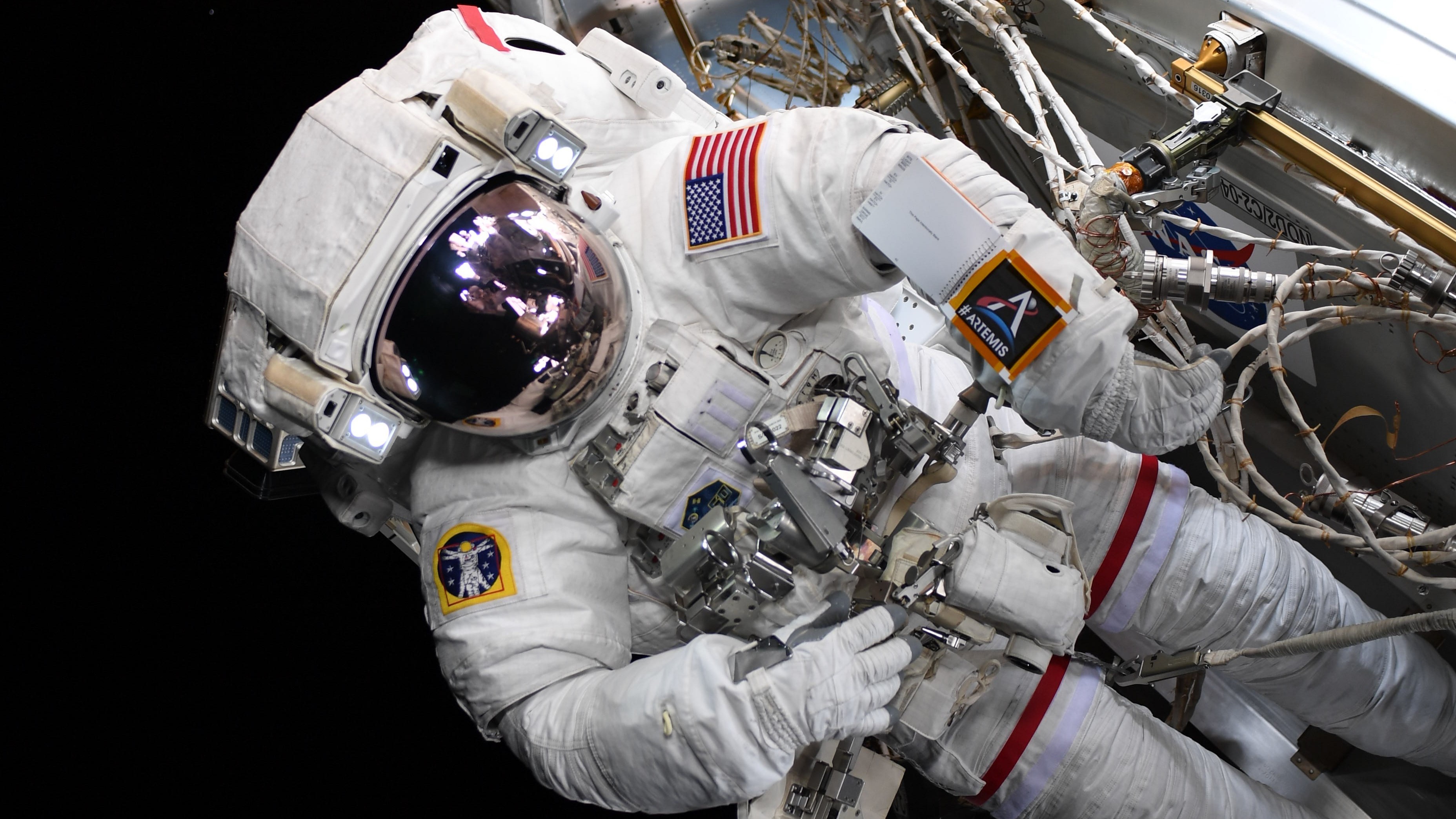 NASA's Artemis Moon Program Just Photobombed a Spacewalk (Photo)