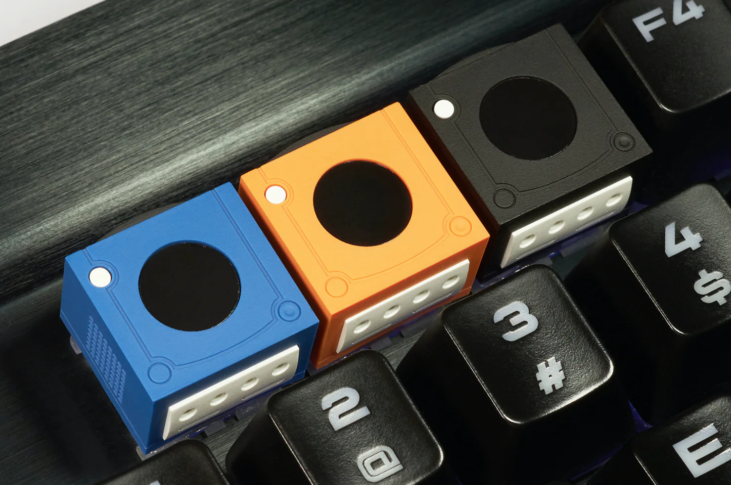 These GameCube keycaps are adorable and on sale