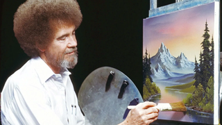 A photo of Bob Ross painting