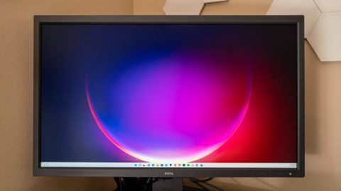 The BenQ SW321C monitor on a desk