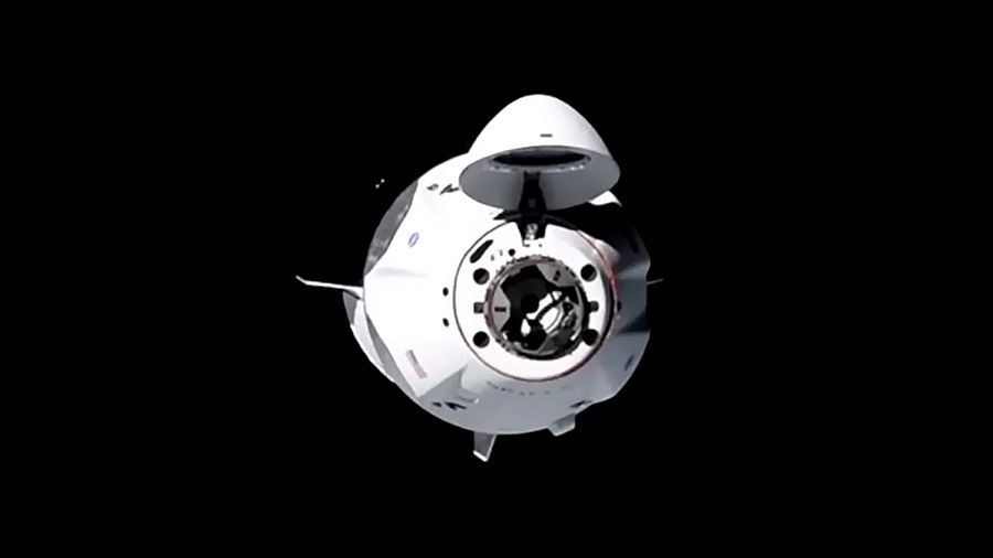 SpaceX Crew Dragon Capsule Docks At Space Station With Its 1st Crew Of