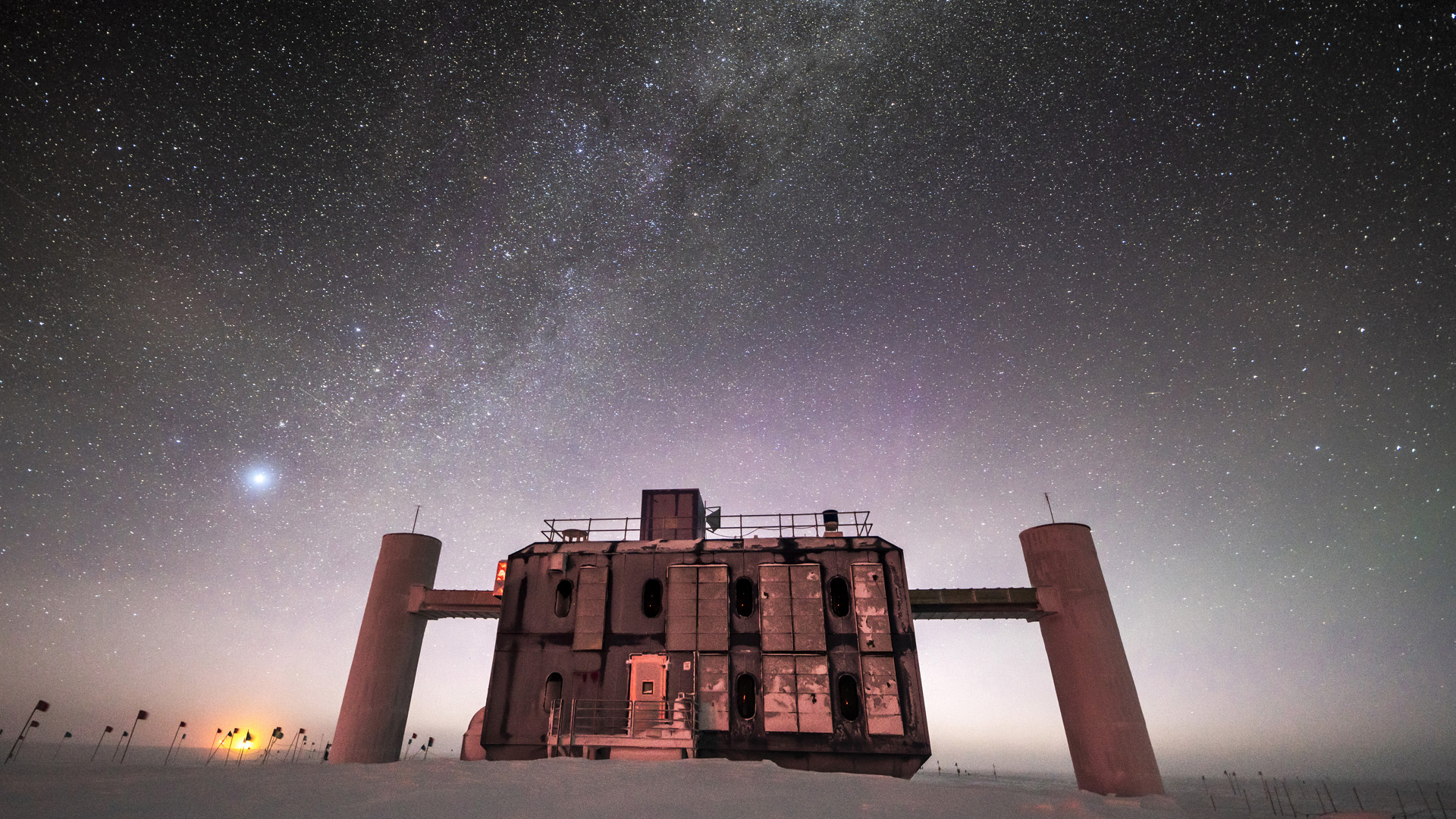 Elusive neutrinos caught streaming from a black hole hidden in dust