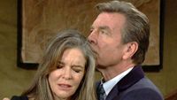 Susan Walters as Diane upset with Peter Bergman as Jack holding her in The Young and the Restless