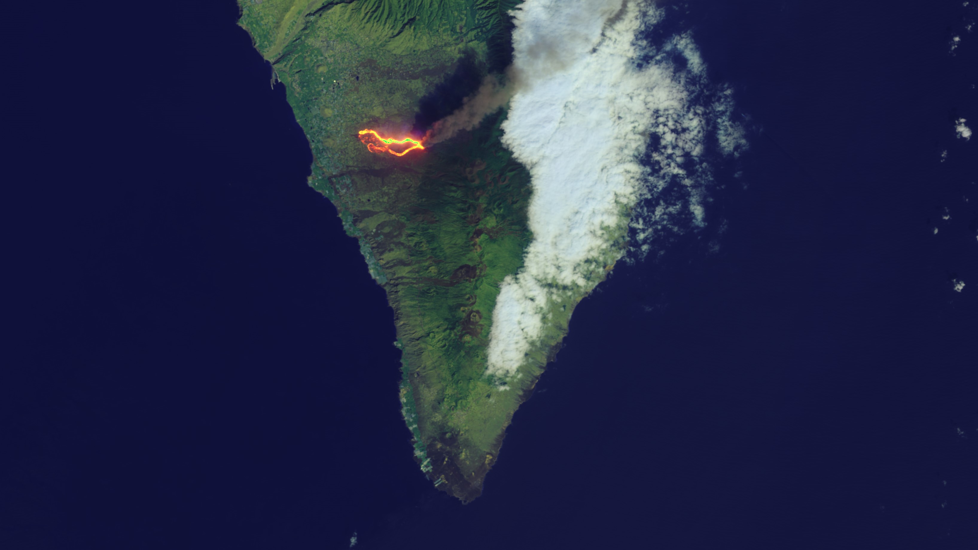 Bright lava flows, smoke pour from La Palma volcano eruption in new Landsat photos thumbnail