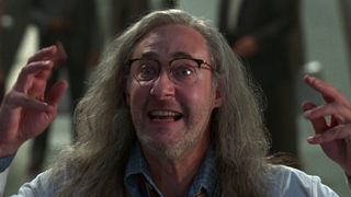 Brent Spiner as Dr Brakish Okun