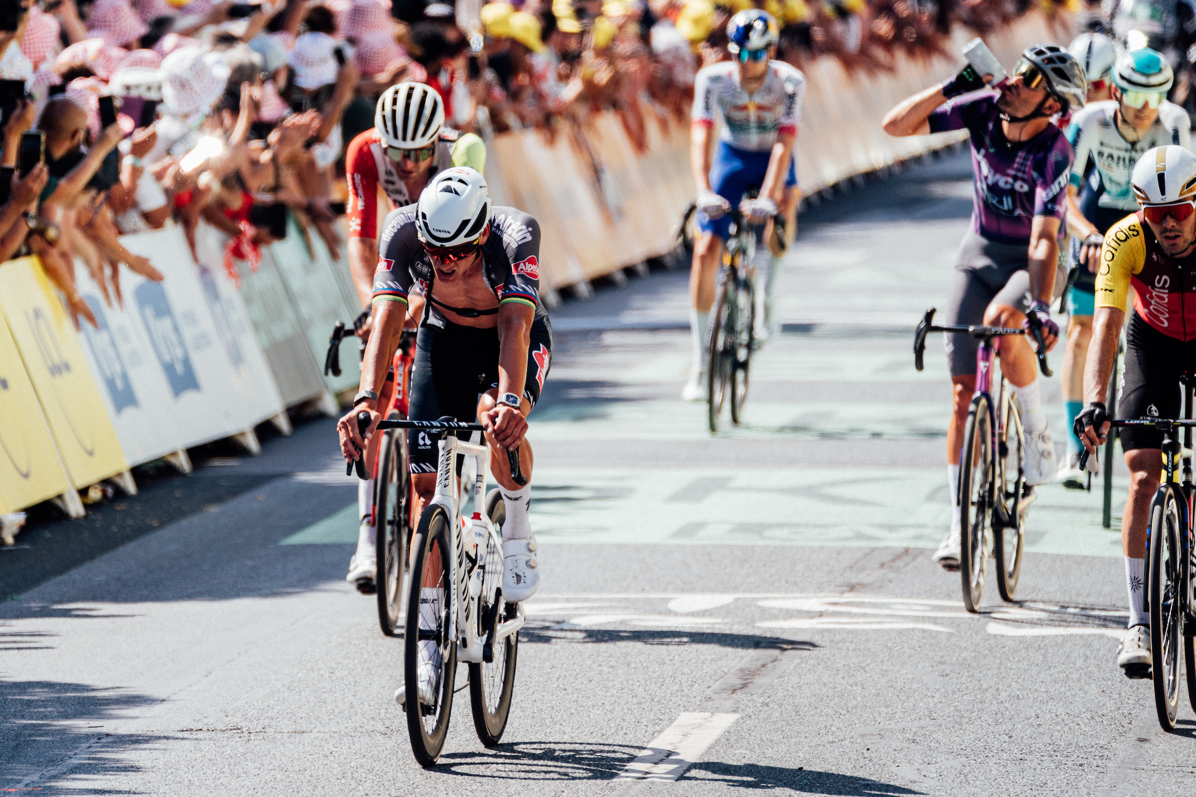 Mathieu van der Poel crosses the line on stage 9 of the Tour de France.