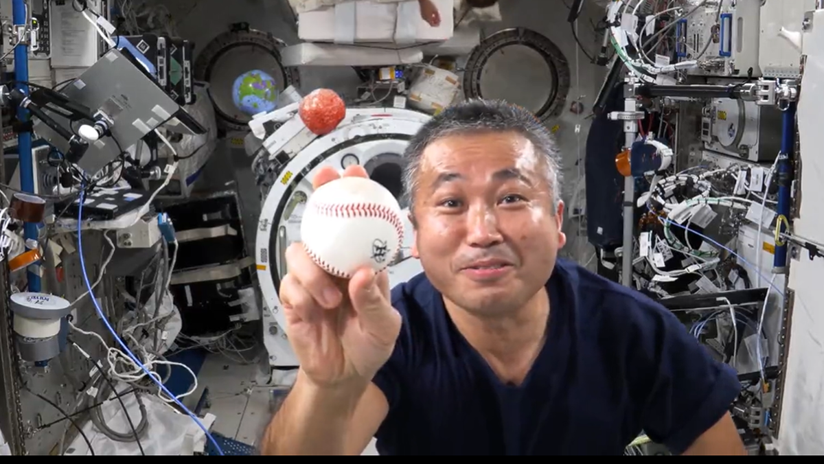 'Play ball!' Space station astronauts celebrate World Series with an orbital pitch