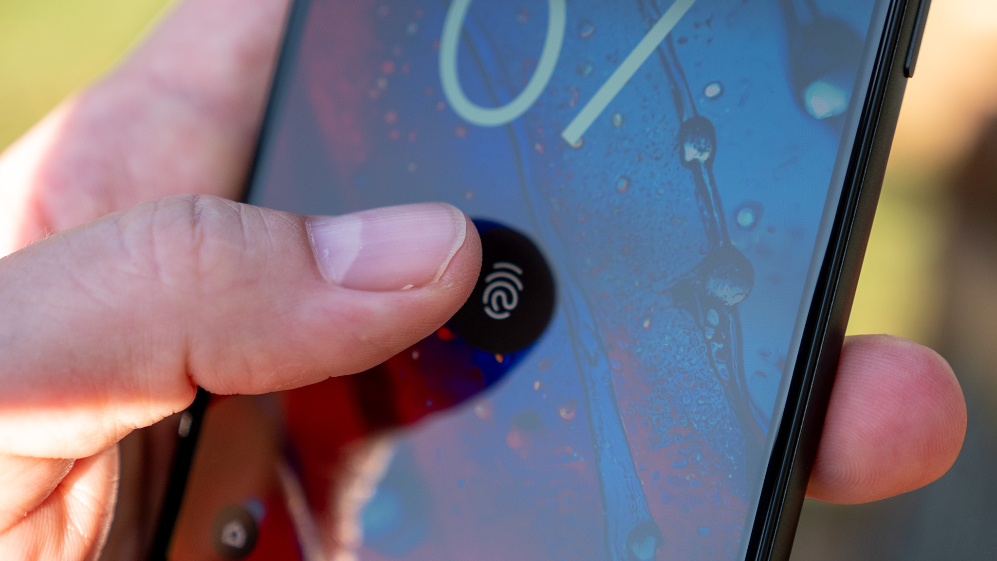 Tapping the in-display fingerprint sensor on the Google Pixel 6a