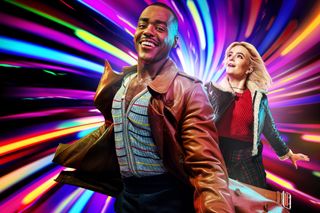 The Doctor (Ncuti Gatwa) is sprinting towards the camera with Ruby (Millie Gibson) behind him, and a kaleidoscope of colours is swirling in the background behind them