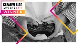 Creative Bloq Awards; a person holds a game controller
