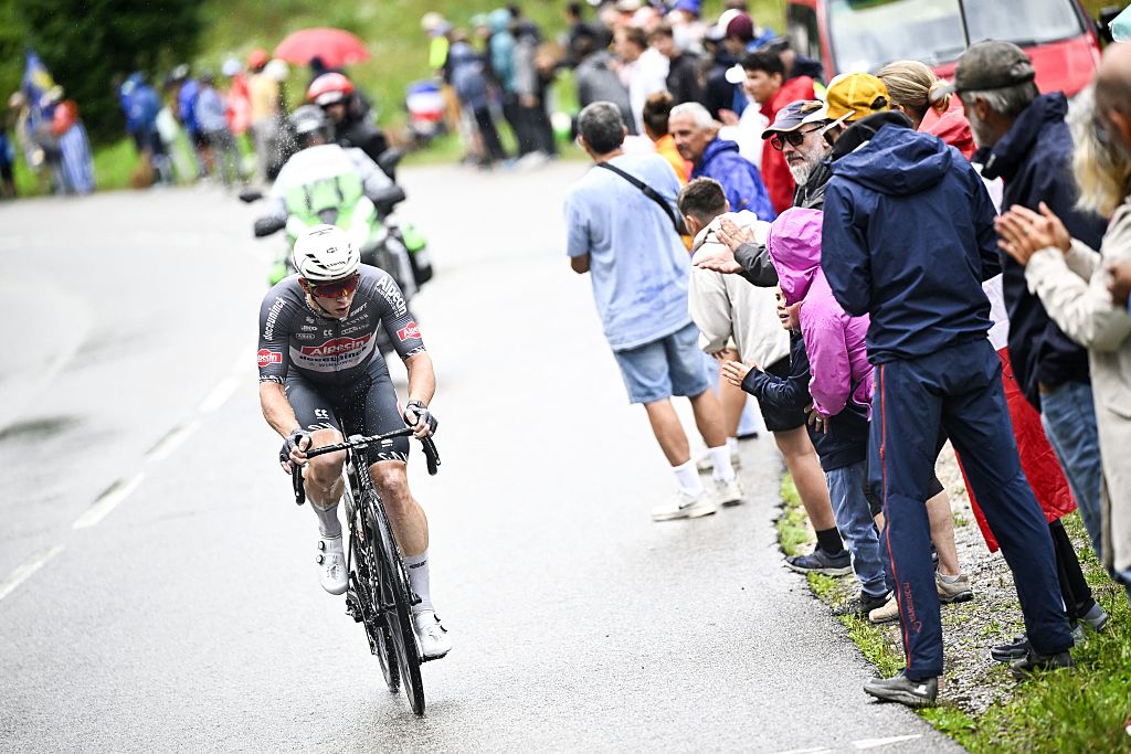 As it happened: Breakaway succeeds on tough, rainy stage 20 of the Tour de France