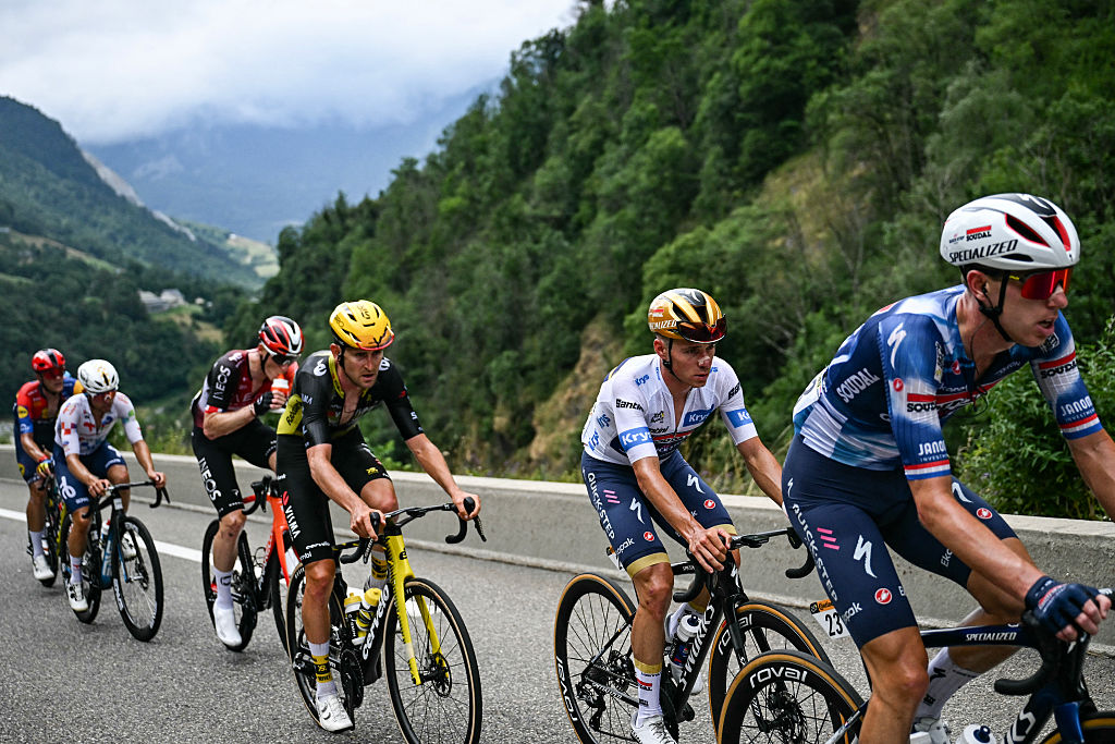 Soudal Quick-Step team&#039;s Belgian rider Remco Evenepoel cycles with the pack of riders (peloton) in the ascent of Col du Tourmalet during the 14th stage of the 112th edition of the Tour de France cycling race, 182.6 km between Pau and Luchon-Superbagneres, in the Pyrenees mountains of southwestern France, on July 19, 2025. Soudal Quick-Step team&#039;s Belgian rider Remco Evenepoel dropped out of the race in the ascent of Col du Tourmalet. (Photo by Loic VENANCE / AFP)