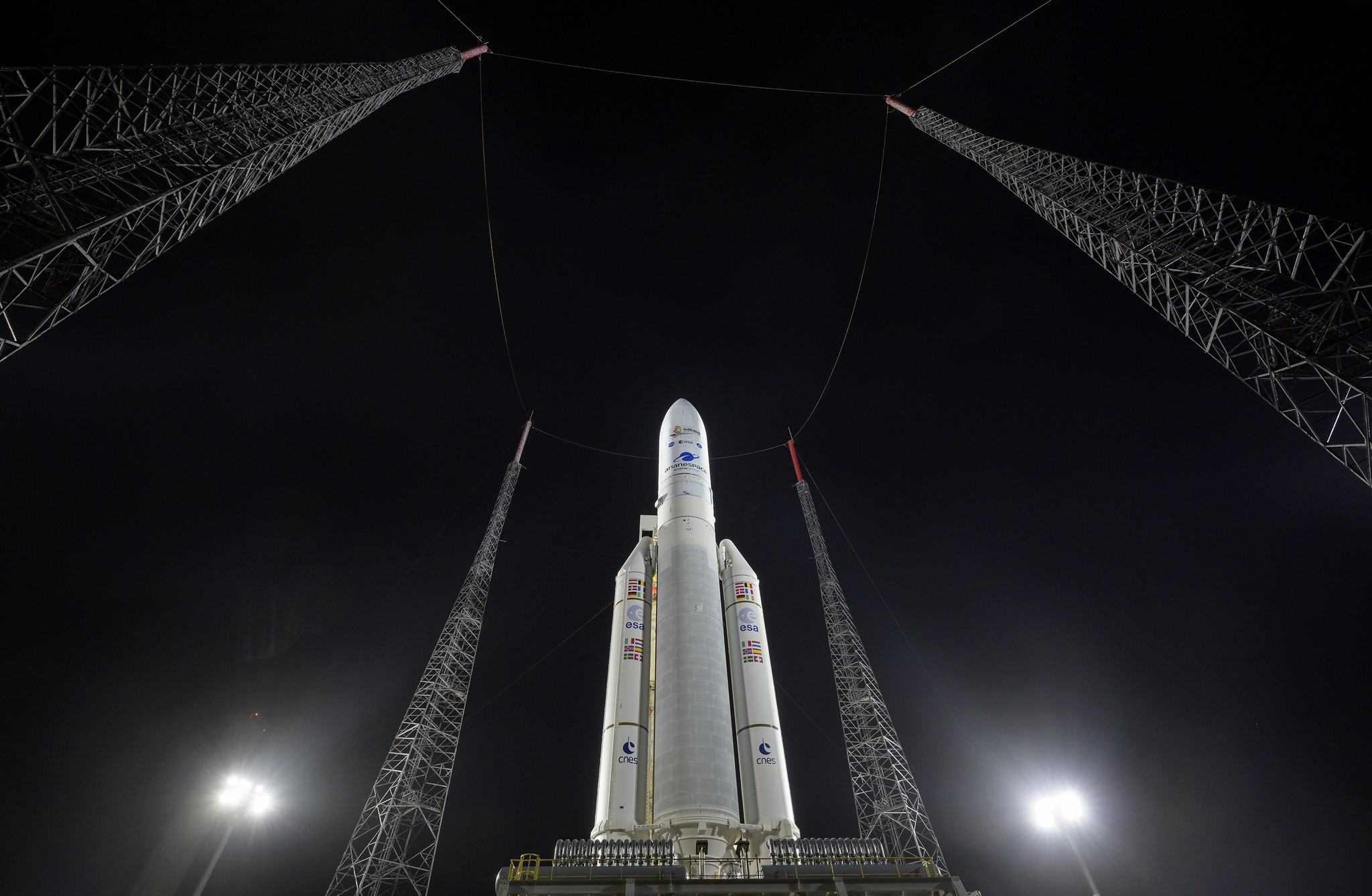 The Ariane 5 rocket carrying the James Webb Space Telescope as seen on the launch pad in Kourou, French Guiana, the evening of Dec. 24, 2021.