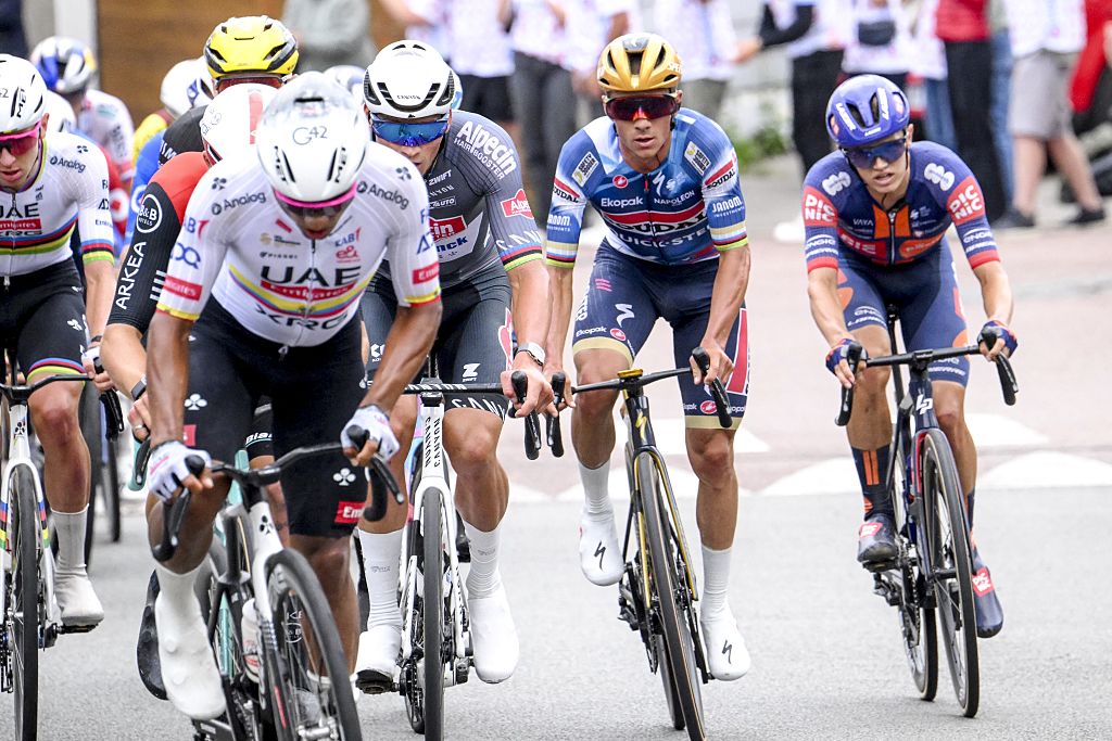 Ecuadorian Jhonatan Narvaez of UAE Team Emirates, Dutch Mathieu van der Poel of Alpecin-Deceuninck, Belgian Remco Evenepoel of Soudal Quick-Step and British Edgar Oscar Onley of Team Picnic PostNL pictured in action during the second stage of the 2025 Tour de France cycling race, from Lauwin-Planque to Boulogne-sur-Mer (212 km), on Sunday 06 July 2025 in France. The 112th edition of the Tour de France starts on Saturday 5 July in Lille, and will finish in Paris on the 27th of July. BELGA PHOTO POOL BERNARD PAPON (Photo by POOL BERNARD PAPON / BELGA MAG / Belga via AFP)