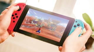 A photo of someone playing a Nintendo Switch