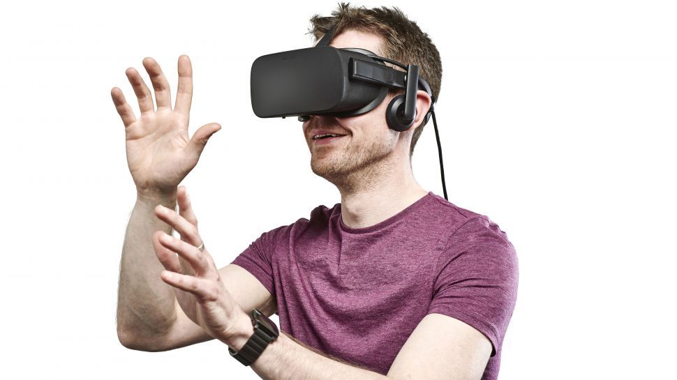 Portrait of a man wearing an Oculus Rift virtual reality 
