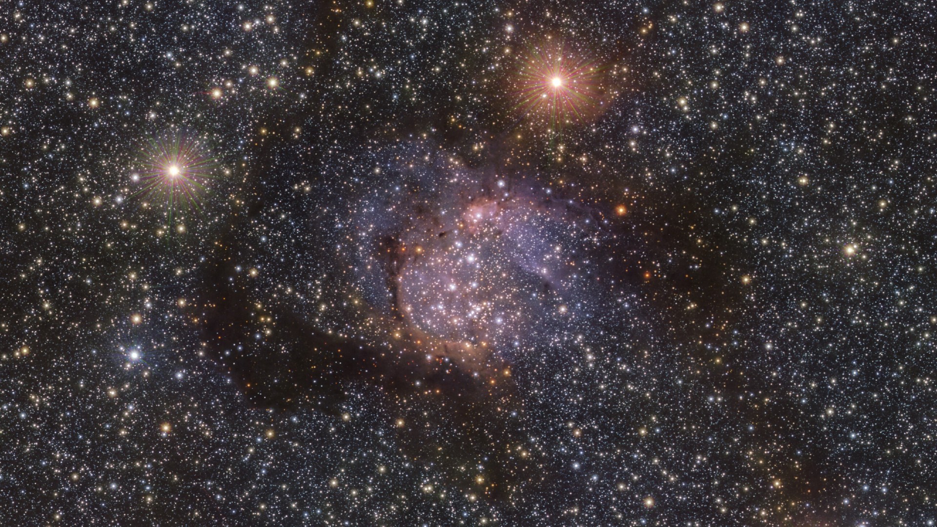 Cosmic serpent slithers through stellar nursery in stunning new image