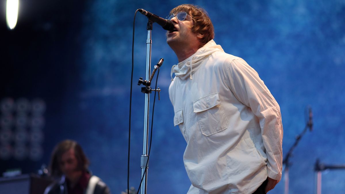 See Stone Roses Guitarist John Squire Join Liam Gallagher Onstage For