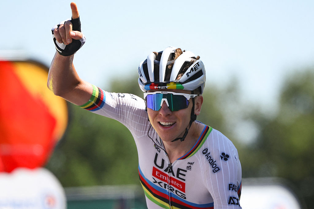 UAE Team Emirate - XRG team&#039;s Slovenian rider Tadej Pogacar cycles to the finish line to win the 7th stage of the 112th edition of the Tour de France cycling race, 197 km between Saint-Malo and Mur-de-Bretagne Guerledan, in Brittany, western France, on July 11, 2025. (Photo by Anne-Christine POUJOULAT / AFP)