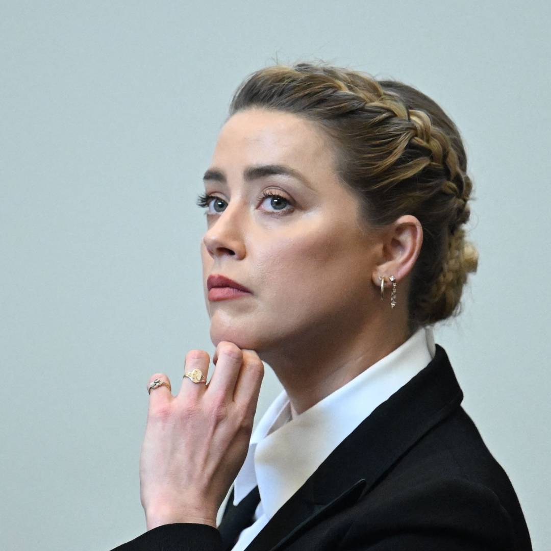  Amber Heard has announced she is settling the Johnny Depp defamation lawsuit 