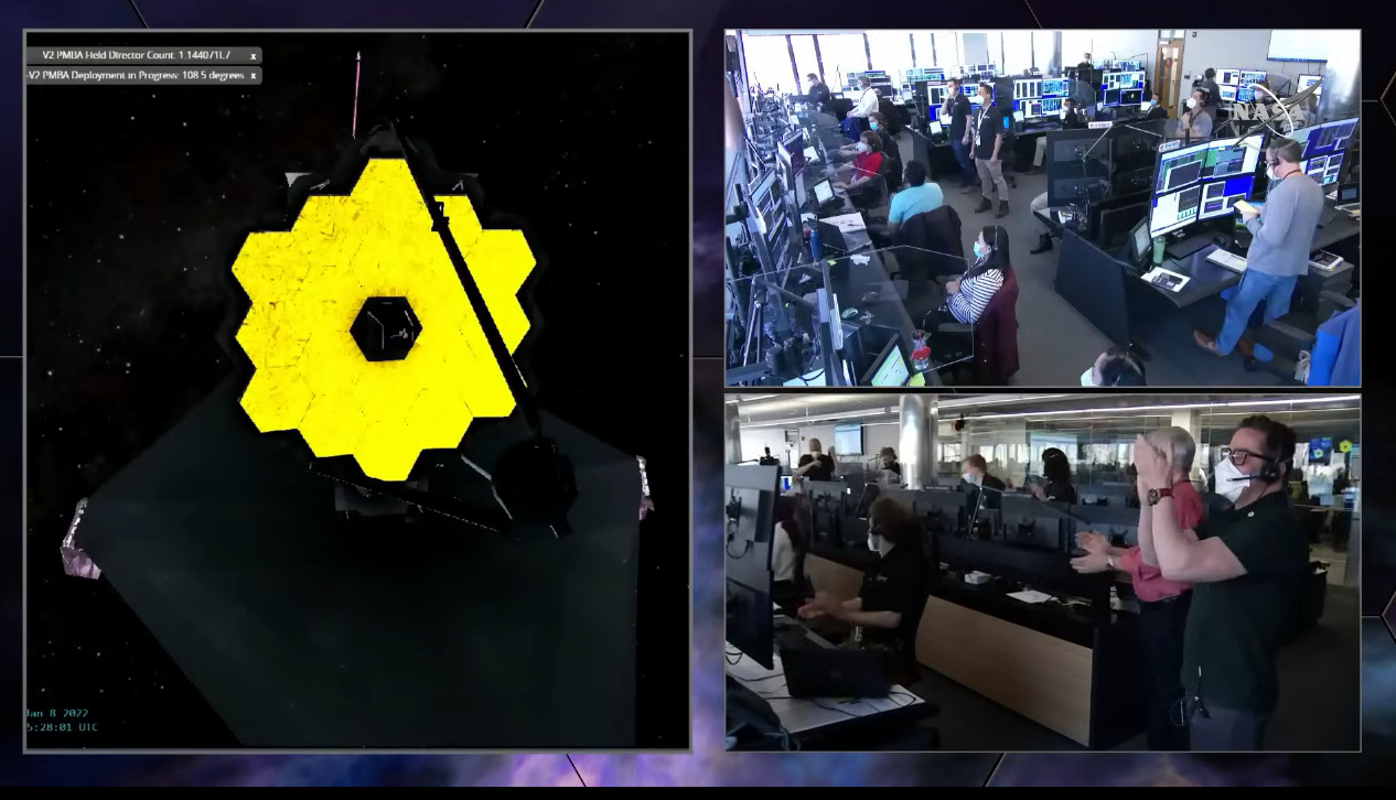 The mission operations team of NASA's James Webb Space Telescope cheers as the huge observatory unfolded its final mirror segments into place to complete its deployment on Jan. 8, 2022.