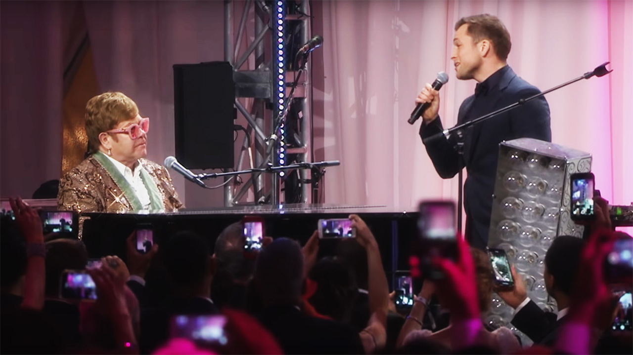 watch elton john duet with rocketman star taron egerton on tiny