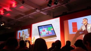 Lenovo vice president of marketing and design Dilip Bhatia shows it off