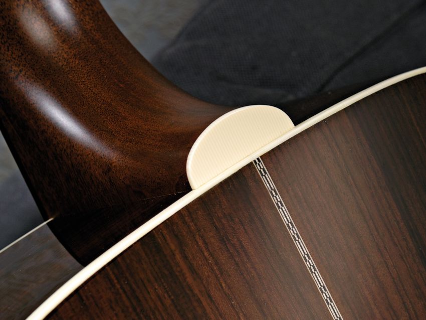 The wood-mosaic back strip adds a touch of class.