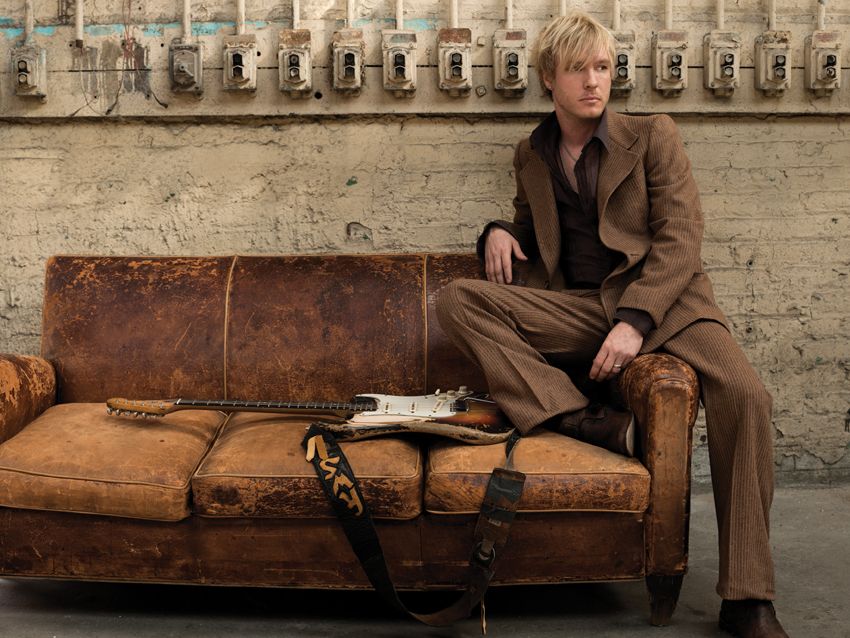 Looking sharp for his album cover shoot. There's that '61 Strat again!