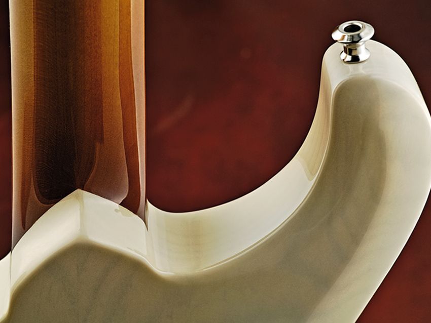 A set neck, and just check out that lovely heel.