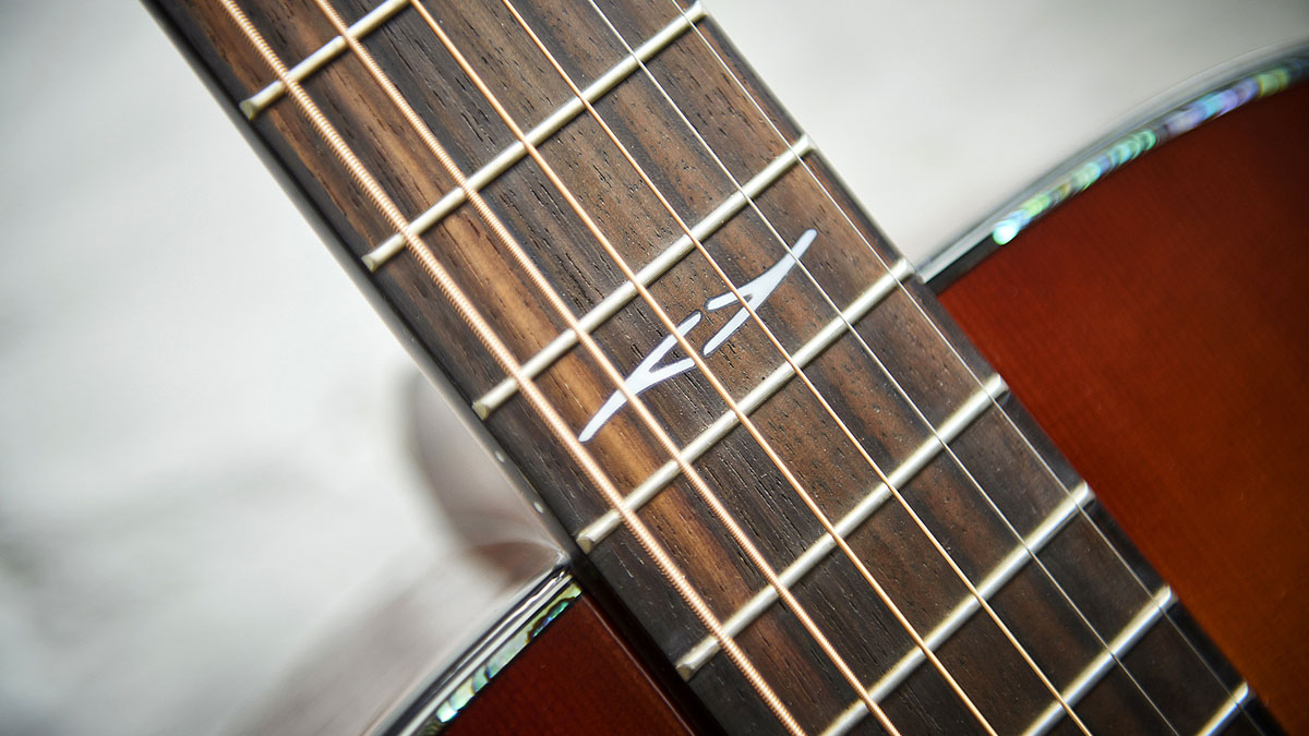 The guitar doesn't have any fretboard markers, just a 12th fret inlay - slightly incongruous on a retro-vibed guitar