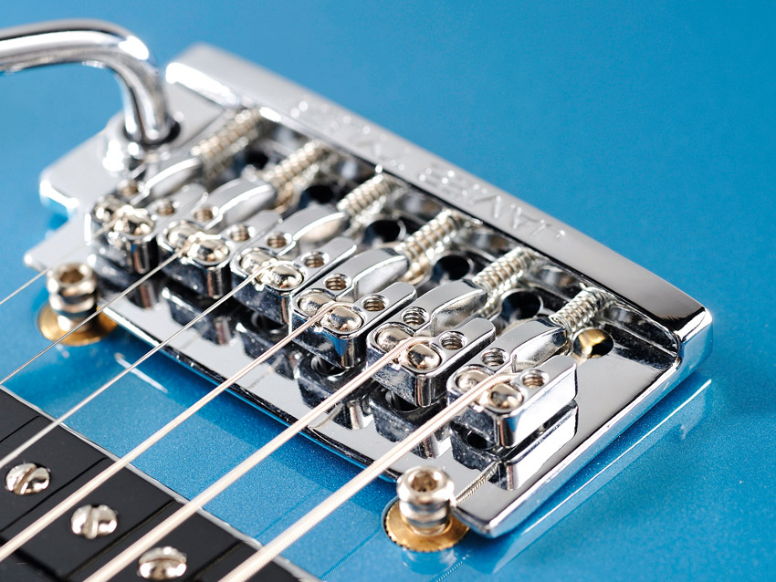 The saddles contain the all-important redesigned piezo elements.