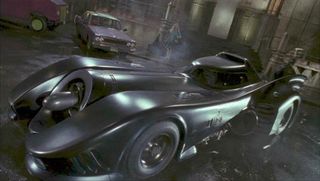 Insanely long Batmobile needed assistance from lampposts to turn corners!