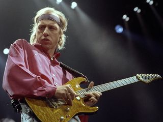 Knopfler onstage with Dire Straits in 1992