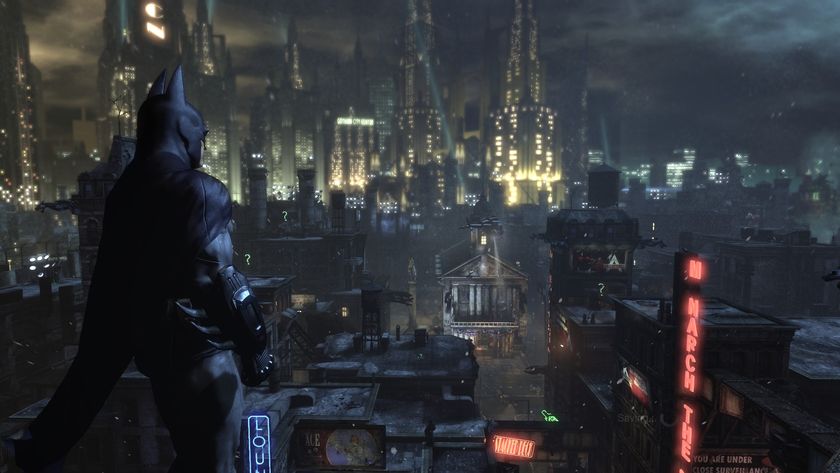 Batman looking over the city during Batman: Arkham City, one of the best PS3 games.