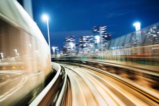 Commuter train speeding by TommL