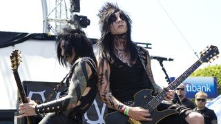 Black Veil Brides' Jinxx (left) and Jake Pitts on stage in Hollywood, CA, 2011