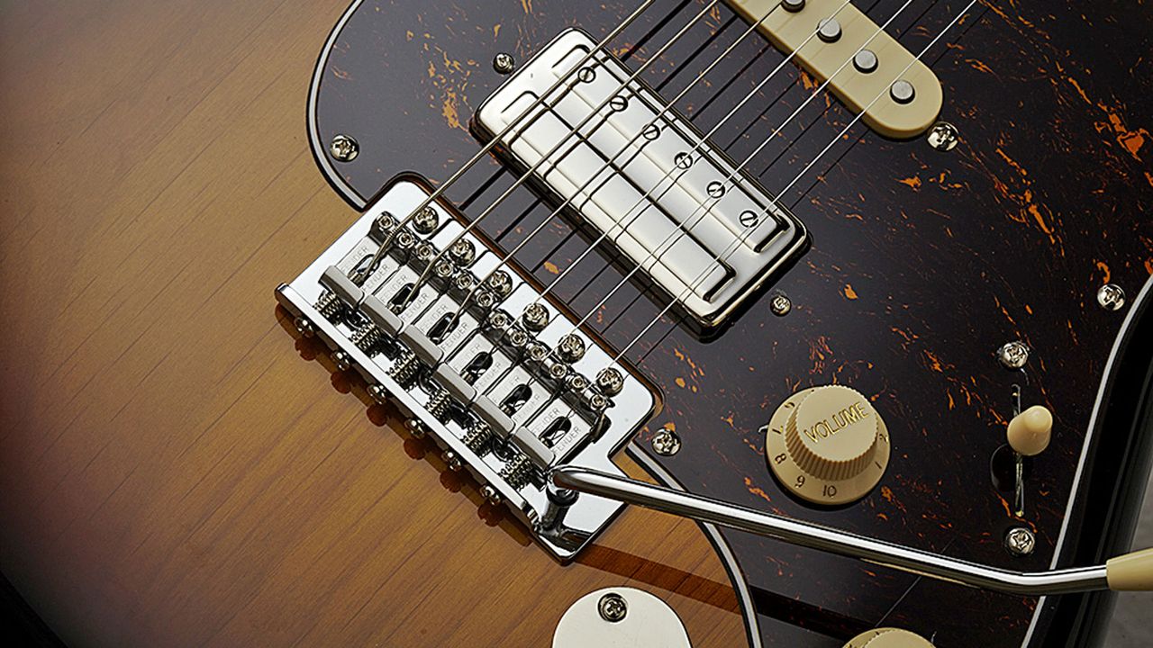 The Stratocaster's vintage-style vibrato performs well out of the box, with three springs providing about the right balance for the reduced tension of a 610mm (24") scale