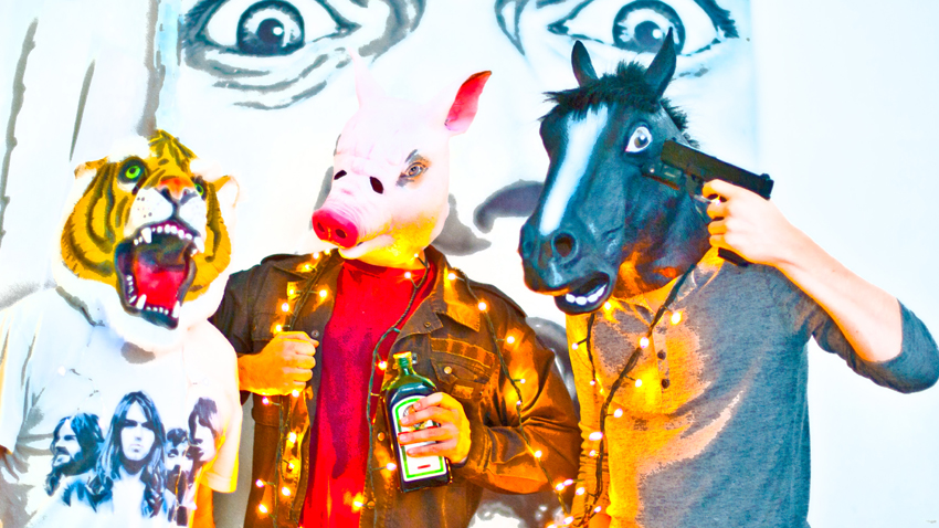 A tiger, a pig and a horse walk in to a bar...