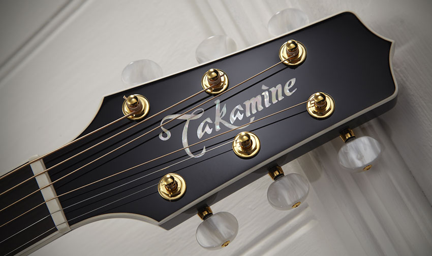 The tuners are gold-plated with pearloid buttons