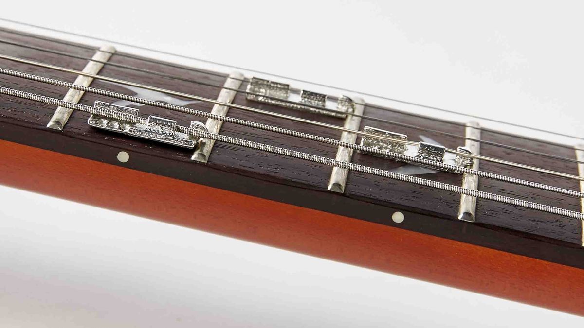 Fretlocks singlestring capos allow guitarists to play "impossible