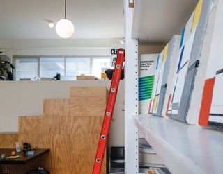 Experimental Jetset has an extensive reference library that covers one of the studio walls, accessible by ladder